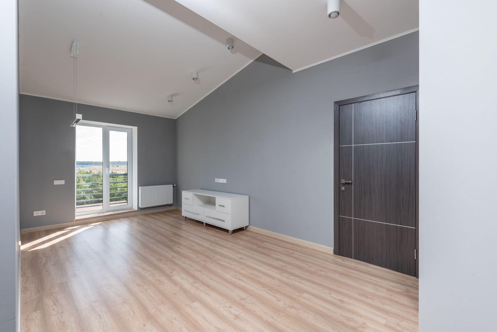 Interior of a modern Slovak new-build apartment with hardwood floors